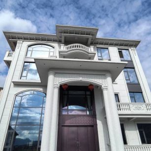 焦作白麻别墅外墙干挂石材效果示例