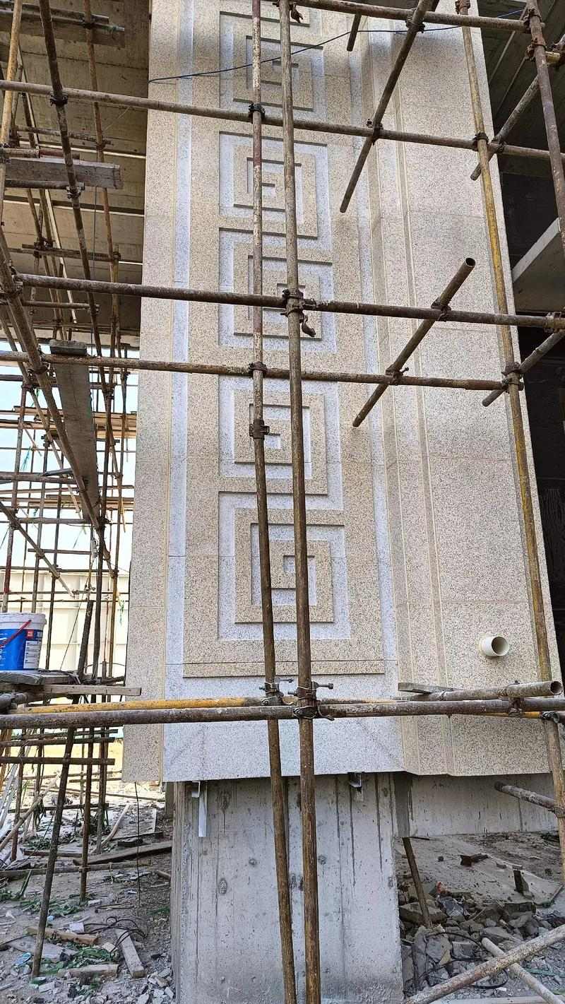 焦作 黄金麻花岗岩别墅外墙干挂回纹造型效果