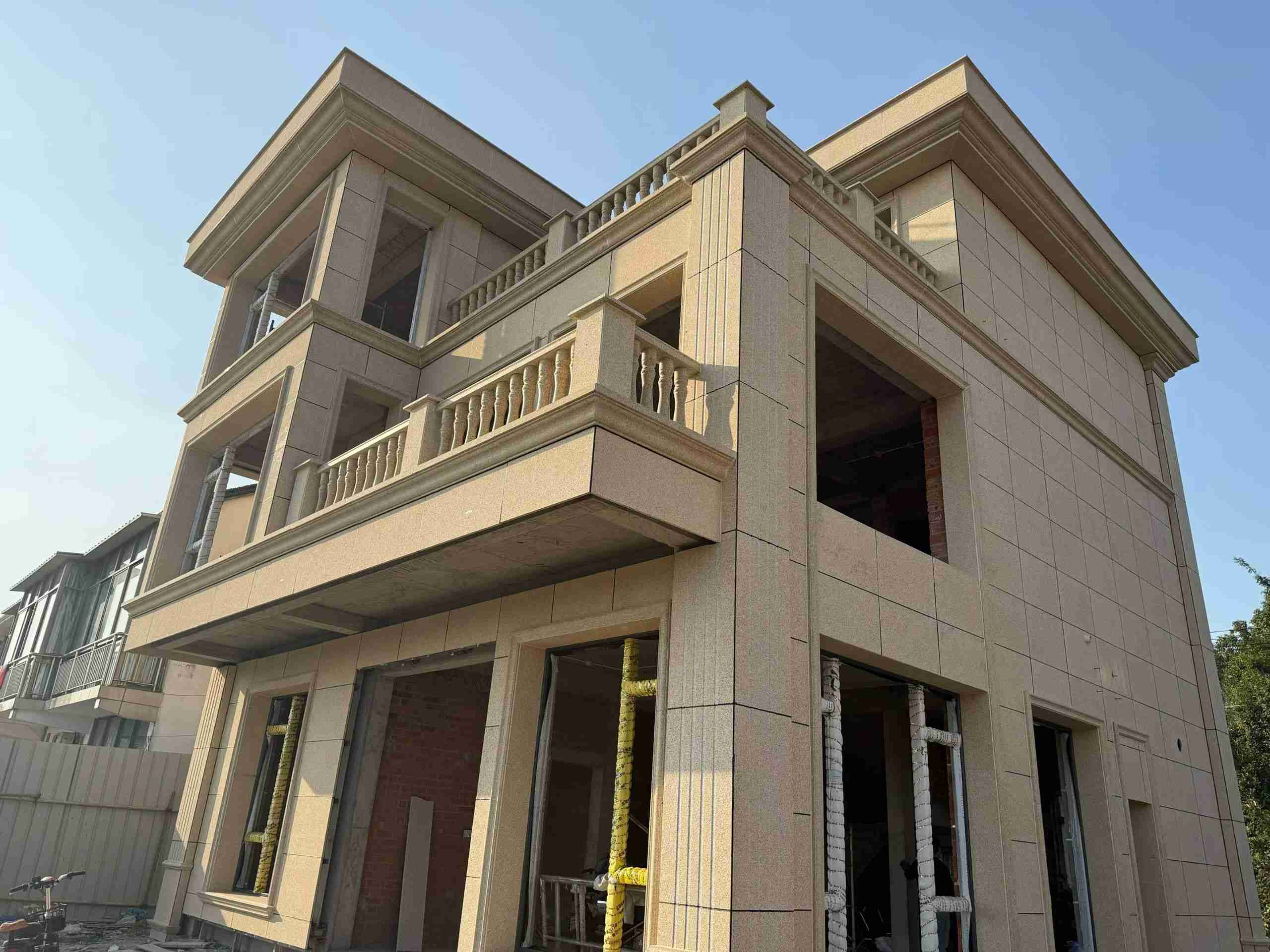 焦作 黄金麻花岗岩石材荔枝面外墙干挂效果展示